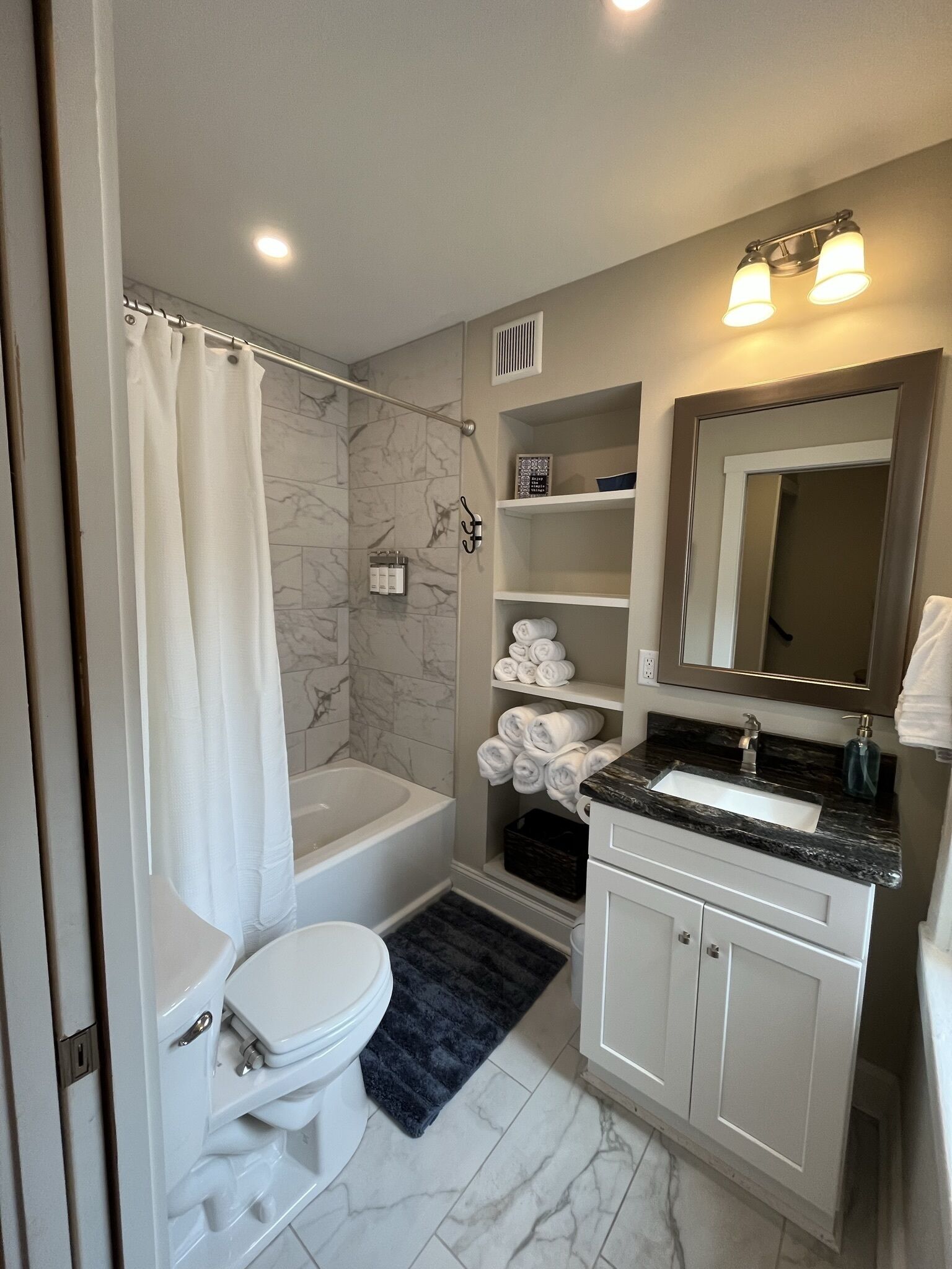 Hair dryer, towels, soap, shampoo