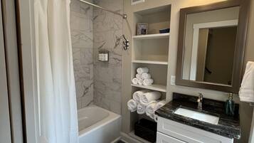 Hair dryer, towels, soap, shampoo