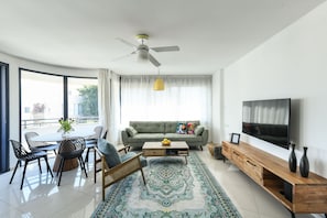 Living area - Stylish 3-BR Apt w Balcony and Parking (Tel Aviv)