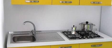 Fridge, oven, dining tables