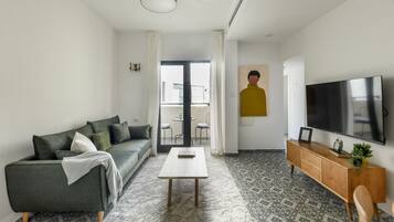 Apartment | Living area | 55-inch Smart TV with cable channels, TV