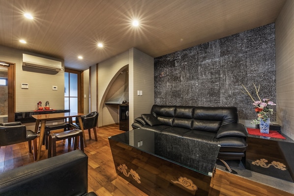 City Townhome | Living area | 55-inch flat-screen TV with digital channels, TV