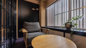 City Townhome | Living area | 55-inch flat-screen TV with digital channels, TV