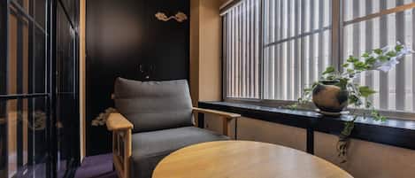 City Townhome | Living area | 55-inch flat-screen TV with digital channels, TV