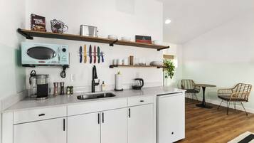 Microwave, coffee/tea maker, cookware/dishes/utensils