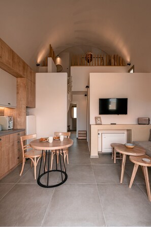 Exclusive Villa | Living area | 24-inch flat-screen TV with satellite channels, Netflix