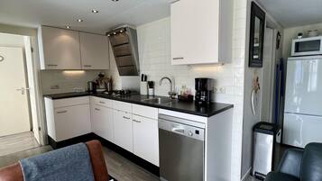 Fridge, microwave, dishwasher, coffee/tea maker