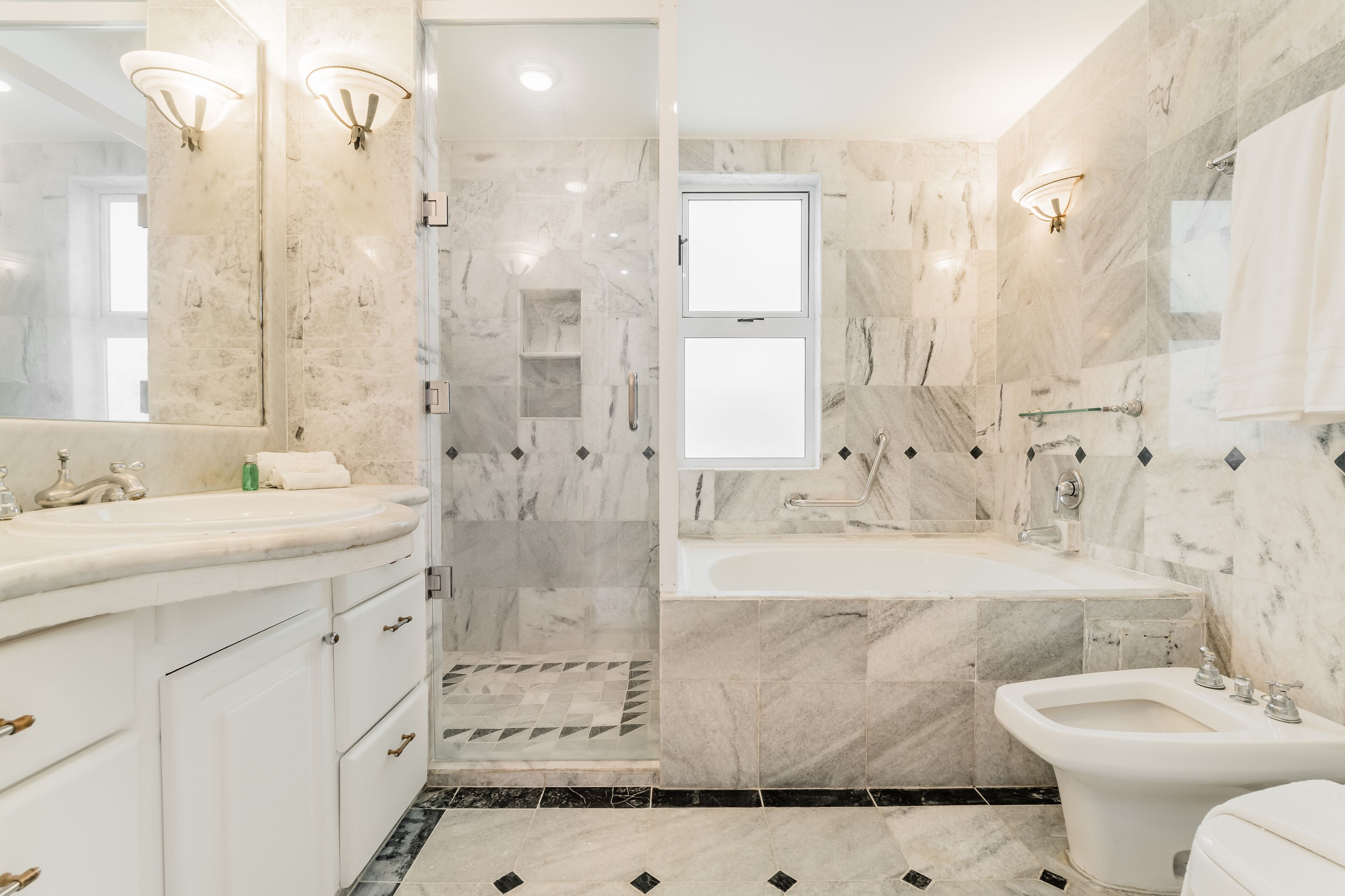 Shower, jetted tub, hair dryer, bidet