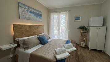 1 quarto, Wi-Fi de cortesia, roupa de cama