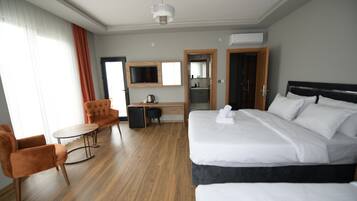 Egyptian cotton sheets, premium bedding, minibar, desk