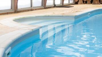 Indoor pool, seasonal outdoor pool, pool umbrellas, sun loungers