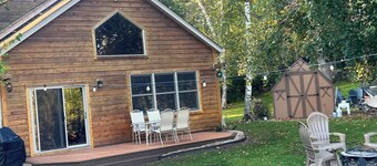 Spacious Summer Escape: Private Backyard, Dock & Fire Pit, Channel Waterfront