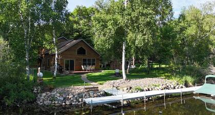 Spacious Summer Escape: Private Backyard, Dock & Fire Pit, Channel Waterfront