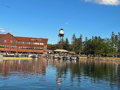 Spacious Summer Escape: Private Backyard, Dock & Fire Pit, Channel Waterfront