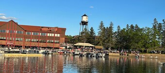 Spacious Summer Escape: Private Backyard, Dock & Fire Pit, Channel Waterfront