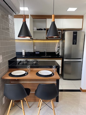 Fridge, microwave, oven, cookware/dishes/utensils