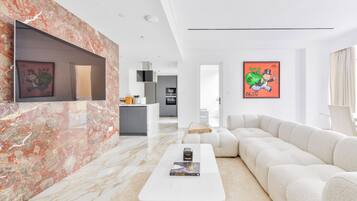 Luxury Apartment, 1 Bedroom, Balcony | Living area | 75-inch LED TV with satellite channels, TV, Netflix