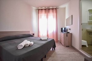 Kamar Double Tradisional | Wi-Fi gratis dan seprai linen