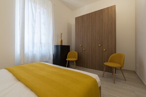 1 habitación, tabla de planchar con plancha, wifi y ropa de cama 