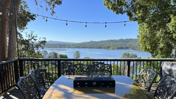 A deck with a table and chairs overlooking a lake. - Incredible Views from Smith Point (Bradley)