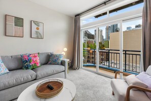 Classic Apartment | Living area | 40-inch TV with digital channels - Belltown Perch explore like a local (Seattle)