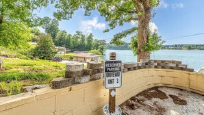 A sign indicating a reserved parking driveway unit 3. - Lake Hickory Trio 1 BR Pink Unit (Catawba County)
