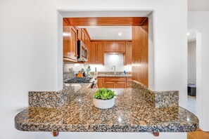 Fridge, microwave, oven, stovetop - Spacious Beach Retreat • Sleeps 8 • Walk to Ocean (San Diego)