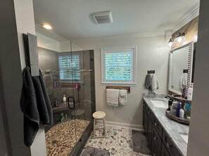 Shower, hair dryer, towels, soap