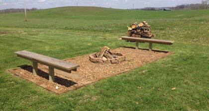 Country setting with mature trees, large deck. Game/Rec room, Fire Pit and Grill