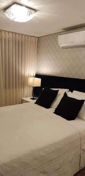 2 quartos, escrivaninha, ferros/tábuas de passar roupa