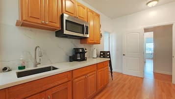 Fridge, microwave, coffee/tea maker, electric kettle