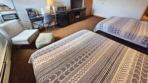 A hotel room with two beds, a desk with a computer, a chair, a lamp, and a television. - Village square 442, Center Village Copper Mountain,Pet Friendly includes parking (Copper Mountain)