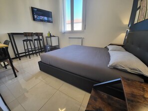 Comfort-byhus - 1 queensize-seng - eget badeværelse - tårn | 1 soveværelse, minibar, skrivebord, arbejdsområde til bærbare computere