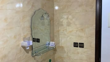 Hair dryer, bidet, towels, soap