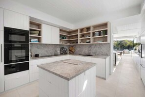 Coffee/tea maker, fridge, microwave, oven