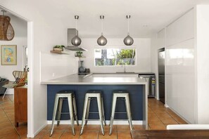 Coffee/tea maker, fridge, microwave, oven