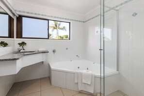 Combined shower/bathtub, soap, shampoo, toilet paper