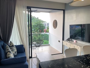 Luxury Apartment, 1 Queen Bed, Mountain View | Living area | Smart TV