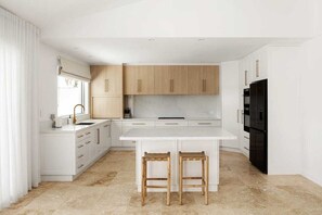 Coffee/tea maker, fridge, microwave, oven