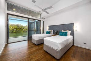 Relax in a serene lakeside retreat with a balcony and stunning views.