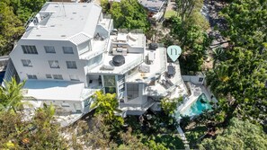 Enjoy the rooftop pool and outdoor seating with views of the surrounding area.