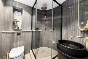 Shower, hair dryer, towels, soap