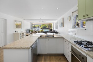 Fridge, oven, stovetop, coffee/tea maker - Noosa Haven Apt 6: Riverside Retreat (Noosaville)