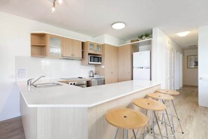 Fridge, stovetop, dining table