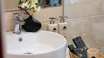 Hair dryer, towels, soap, shampoo