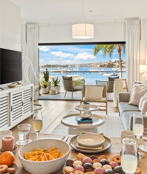 The Cocos Apartment at Palm View Collective | Living area | Flat-screen TV - Palm View Collective (Elizabeth Bay)