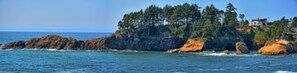 Situated on a rocky outcrop, this property offers stunning ocean views.
