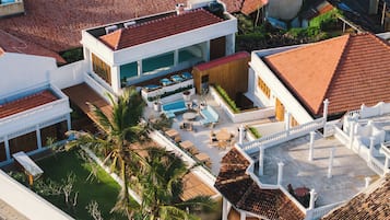 Outdoor pool, open 8:00 AM to 9:00 PM, pool umbrellas