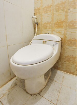 Habitación doble Deluxe | Baño | Regadera, jabón, shampoo 