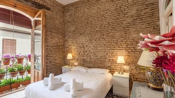 1 habitación, tabla de planchar con plancha, cuna de viaje y wifi